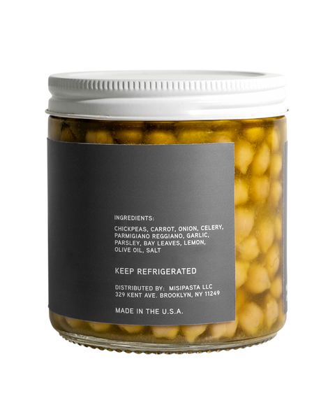 Jar of chickpea salad with a label on a white background