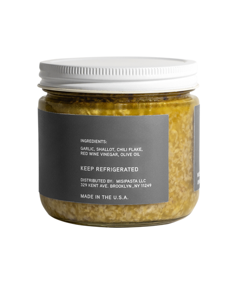 Jar of pasta with a label on a white background