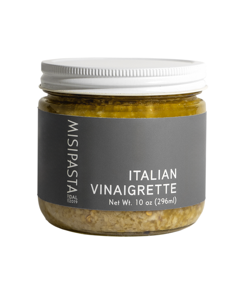 Jar of Misipasta Italian Vinaigrette on a white background