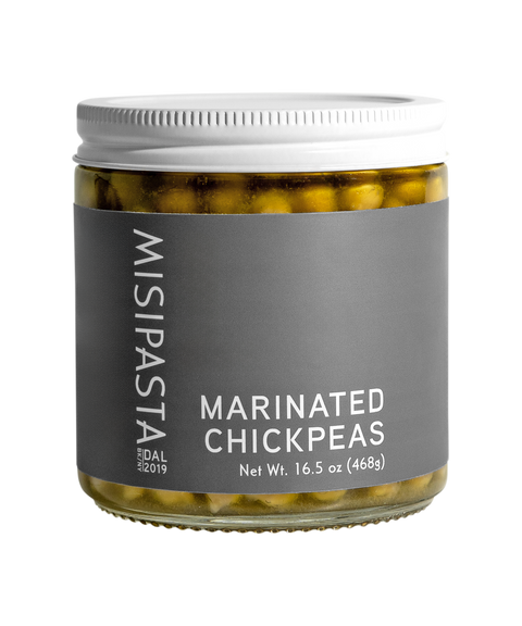 Jar of Misipasta marinated chickpeas on a white background