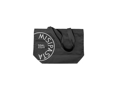 Black tote bag with 'MISIPASTA' branding on a white background